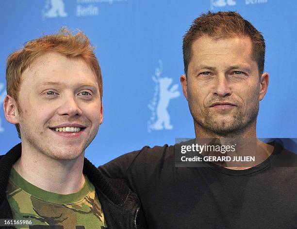 British actor Rupert Grint and German actor Til Schweiger pose at a photocall for the film "The Necessary Death of Charlie Countryman" during the...
