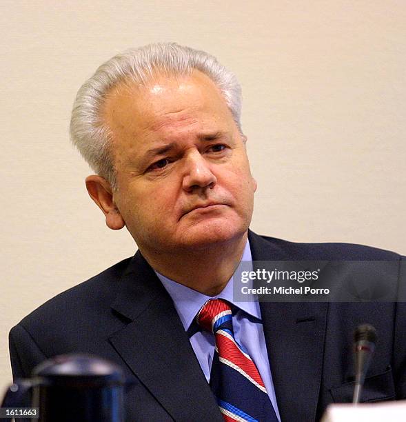 Former Yugoslav strongman Slobodan Milosevic appears for the second time before the Yugoslav war crimes tribunal August 30, 2001 in The Hague, the...