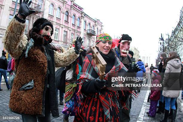 Revellers parade through the streets of the old town of Vilnius to celebrate ‘Uzgavenes’ or 'the time before lent' on February 9, 2013. 'Uzgavenes'...