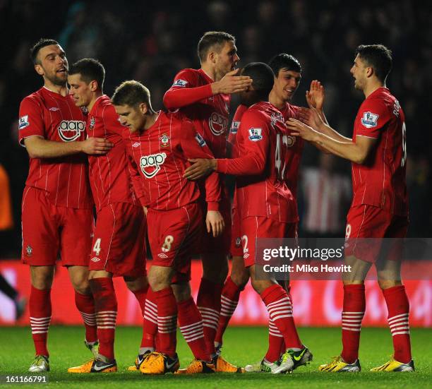 Southampton players celebrate after Gareth Barry of Manchester City scores an own goal making it 3-1 during the Barclays Premier League match between...