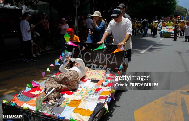 People attend the celebration of World Day of Laziness in Itagui, Colombia, on August 20, 2023.