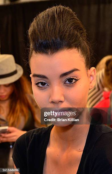 Model poses backstage just before the start of the Son Jung Wan during Fall 2013 Mercedes-Benz Fashion Week at The Studio at Lincoln Center on...