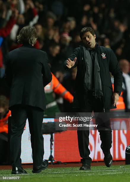 Manager Mauricio Pochettino of Southampton goes to shake hands with manager Roberto Mancini of Manchester City during the Barclays Premier League...