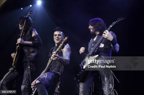 American heavy metal musicians, from left, guitarist Keri Kelli, bassist Chuck Garric, and guitarist Jason Hook perform with Alice Cooper at the...