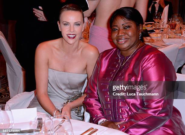 Charlize Theron and Fatou Bensouda during the Cinema For Peace Gala Ceremony at the 63rd Berlinale International Film Festival at the Waldorf Astoria...