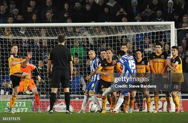 Vicente Rodriguez of Brighton & Hove Albion scores the only goal of the game from a free kick during the npower Championship match between Brighton &...