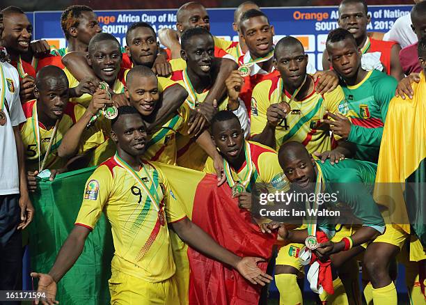 Mali team celebrates after winning the 2013 Africa Cup of Nations Third Place Play-Off match between Mali and Ghana on February 9, 2013 in Port...
