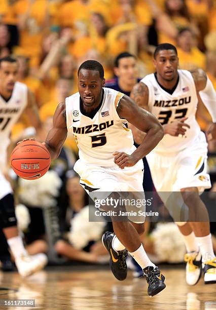 Keion Bell of the Missouri Tigers controls the ball during the game against the Mississippi Rebels at Mizzou Arena on February 9, 2013 in Columbia,...