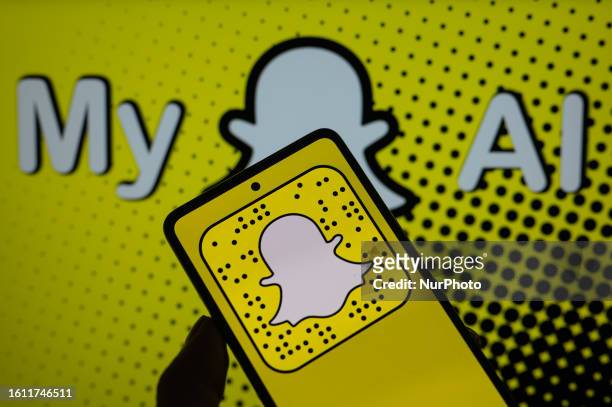 SnapChat icon displayed on a smart phone with in the background SnapChat My AI, seen in this photo illustration, on August 20 in Brussels, Belgium.