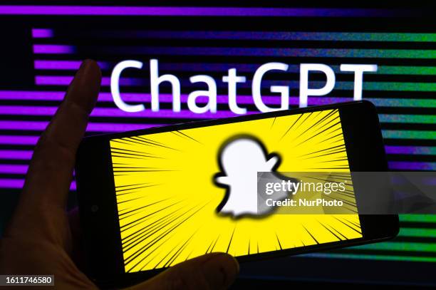 SnapChat icon displayed on a smart phone with in the background ChatGPT, seen in this photo illustration, on August 20 in Brussels, Belgium.