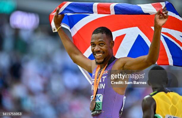 Budapest , Hungary - 20 August 2023; Zharnel Hughes of Great Britain celebrates winning bronze in the men's 100m final during day two of the World...