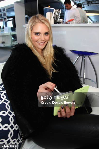 Model Dani Seitz attends the VIP reception for Herve Leger by Max Azria hosted by Samsung Galaxy Lounge at Mercedes-Benz Fashion Week Fall 2013...