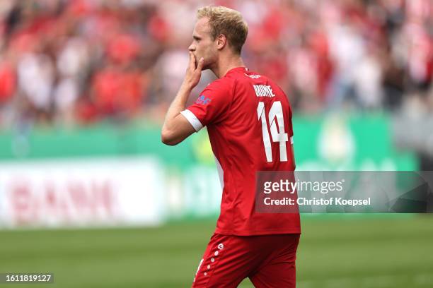 Lucas Brumme of Essen celebrates the third goal during the DFB cup first round match between Rot-Weiss Essen and Hamburger SV at Stadion an der...