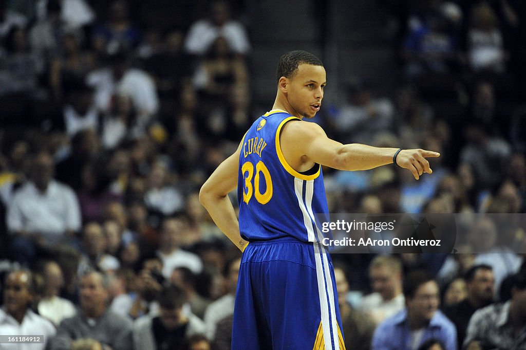 Golden State Warriors point guard Stephen Curry (30) gives instructions to his team against the Denver Nuggets during the first half on Monday, Aril 11, 2011 at the Pepsi Center. AAron Ontiveroz, The Denver Post