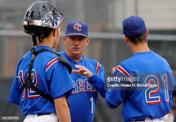 Cherry Creek head coach Marc Johnson talks with catcher Lane Millisan...  News Photo - Getty Images
