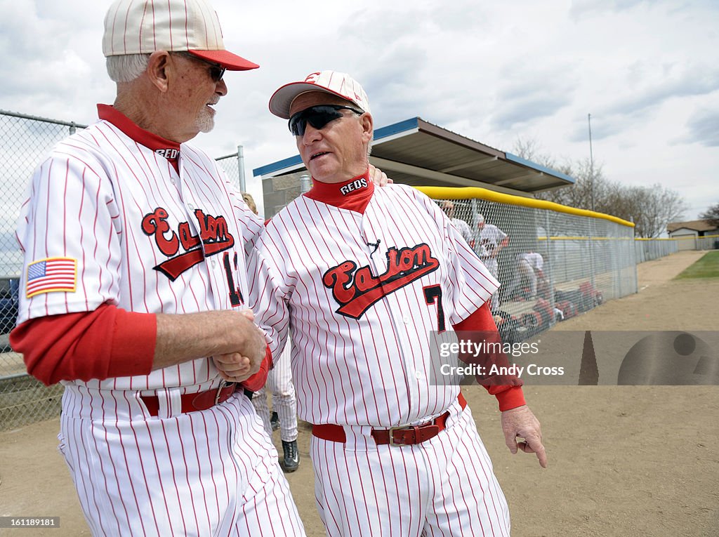 KERSEY, CO--Eaton Reds Assistant coach, Bob Ervin, left, congratulates head coach, Jim Danley after defeating Platte Valley in Kersey Colorado Saturday April 16th 2011 giving Danley his 700th win. Andy Cross, The Denver Post