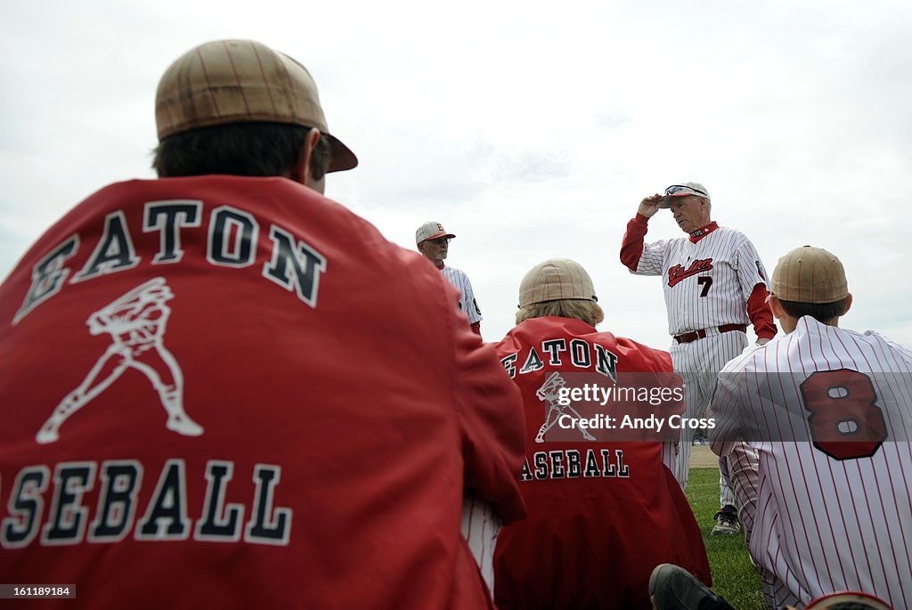 KERSEY, CO--Eaton Reds coach, Jim Danley #7, talks with his team after defeating Platte Valley in Kersey Colorado Saturday April 16th 2011 for his 700th win. Andy Cross, The Denver Post