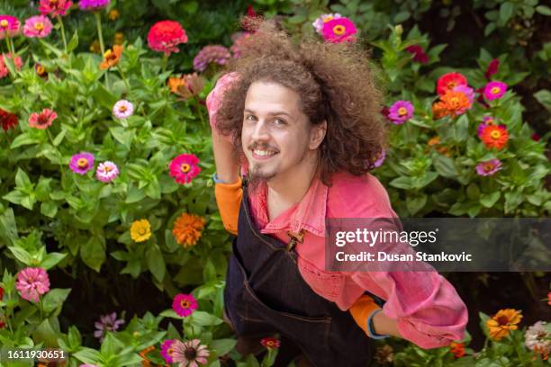 if you need to take care of flowers, call me! - grounds stock pictures, royalty-free photos & images