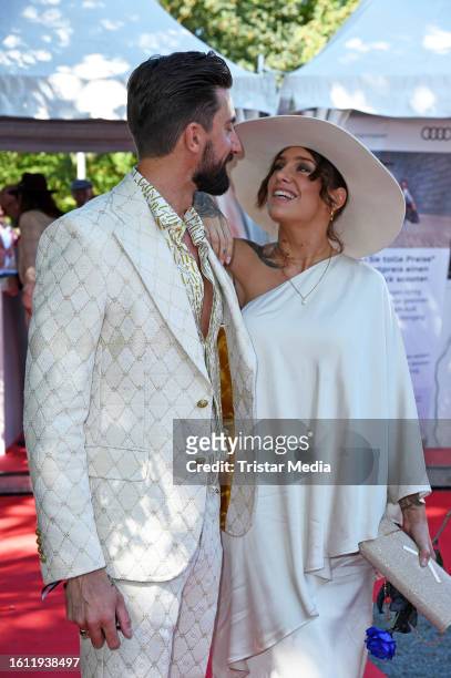 Sebastian Fobe and Liza Waschke during the Audi Ascot race day at race track Neue Bult on August 20, 2023 in Hanover, Germany.