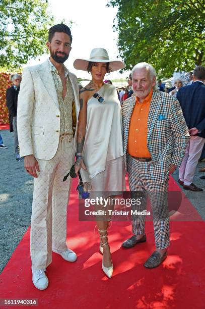 Sebastian Fobe, Liza Waschke and Rolf Eisenmenger during the Audi Ascot race day at race track Neue Bult on August 20, 2023 in Hanover, Germany.