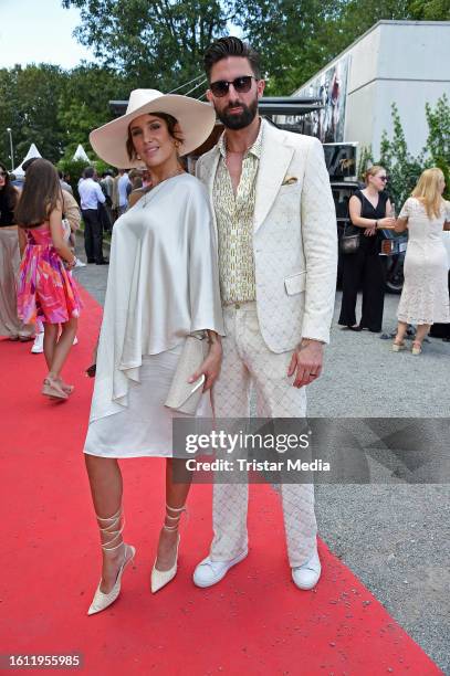 Liza Waschke and Sebastian Fobe during the Audi Ascot race day at race track Neue Bult on August 20, 2023 in Hanover, Germany.
