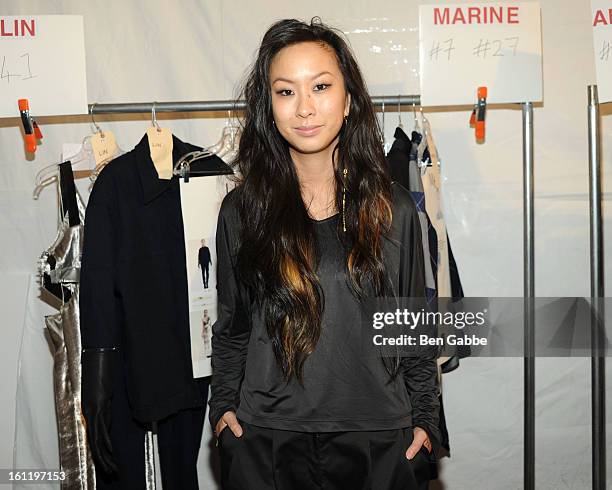 Designer Jen Kao poses backstage at the Jen Kao fall 2013 fashion show during Mercedes-Benz Fashion Week at Skylight Studios at Moynihan Station on...