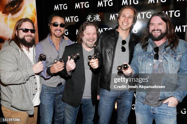 Musicians Coy Bowles, Danny Reyes, Chris Fryar, Jimmy De Martini, and Clay Cook of the Zac Brown Band attend the GRAMMY Gift Lounge during the 55th...