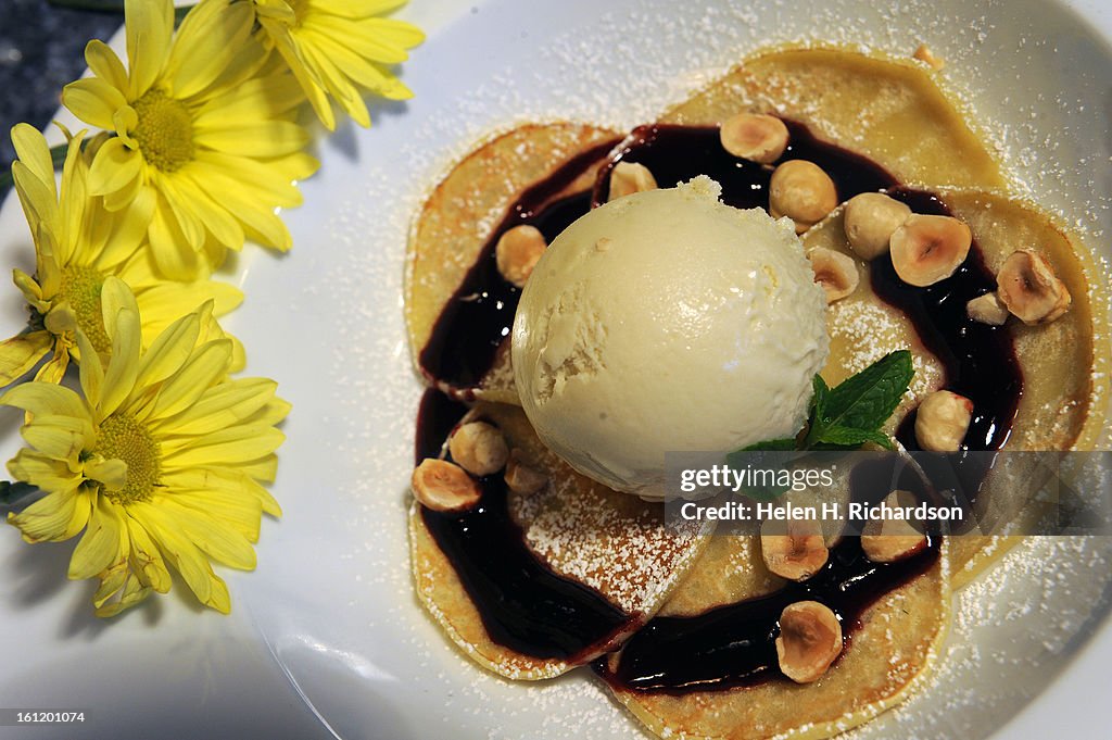 This dessert is Boompa's Swedish pancakes with Alpine Berry tea ice cream adn blueberry sauce. Trillium is a new Scandinavian restaurant and bar in LoDo located at 2134 Larimer street. It specializes in foods from Scandinavia. Helen H. Richardson, The Den