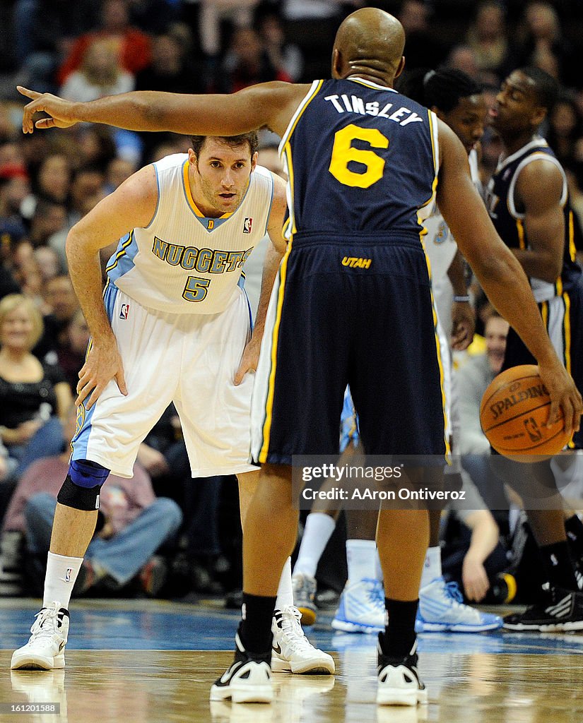 Utah Jazz point guard Jamaal Tinsley (6) calls a play as Denver Nuggets shooting guard Rudy Fernandez (5) defends during the fourth quarter of the Nuggets' 117-100 at the Pepsi Center on Wednesday, December 28, 2011. AAron Ontiveroz, The Denver Post