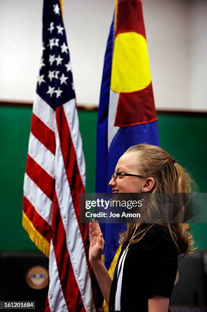 Sen. Jeanne Nicholson swears in 11 year old Sarah Burke from Dillon Valley Elementary in Silverthorne as a youth senator during the first Girls With...