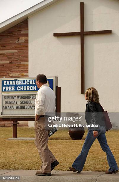 Members of the Free Evangelical church in Burlington arrive for Sunday morning worship services. The church is still reeling from the murders of two...