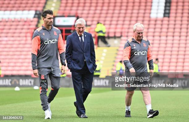 Paddy McCarthy, Roy Hodgson, Ray Lewington of Crystal Palace arrive for the Premier League match between Sheffield United and Crystal Palace at...