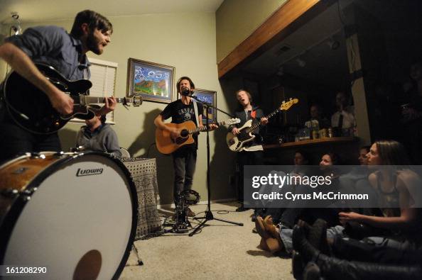 House concert at the home of Bodie Johnson in Boulder with the musician Joshua James from Salt Lake City on Thursday, March 10, 2011. Left to right: Evan Coulombe, on guitar and drum, Joe LaChance on keyboards, Joshua James, singer and guitar, and Kyle He House concert at the home of Bodie Johnson in Boulder with the musician Joshua James from Salt Lake City on Thursday, March 10, 2011. Left to right: Evan Coulombe, on guitar and drum, Joe LaChance on keyboards, Joshua James, singer and guitar, and Kyle He