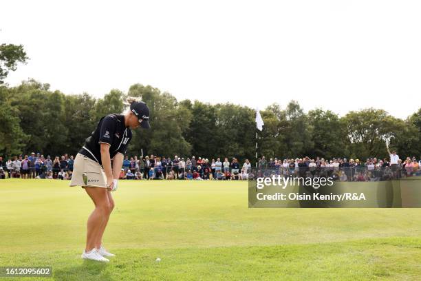 Charley Hull of England chips onto the 7th green on Day Four of the AIG Women's Open at Walton Heath Golf Club on August 13, 2023 in Tadworth,...