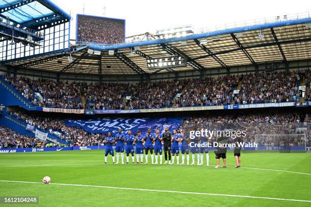 General view of the inside of the stadium as players of Chelsea pause for a minutes applause in memory of former Chelsea Player and Manager John...