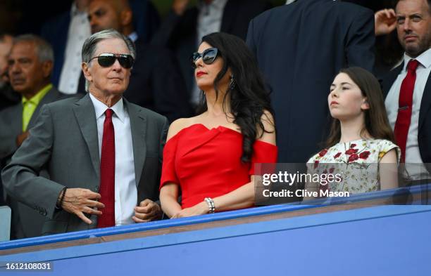 John W Henry, Owner of Liverpool, looks on as he stands with his family in the stand prior to the Premier League match between Chelsea FC and...