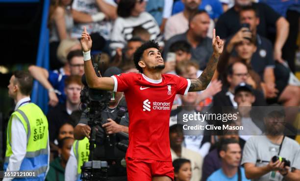Luis Diaz of Liverpool celebrates after scoring the team's first goal during the Premier League match between Chelsea FC and Liverpool FC at Stamford...