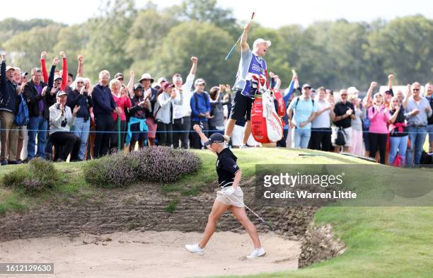 Charley Hull of England celebrates an eagle on the 11th green on Day Four of the AIG Women's Open at Walton Heath Golf Club on August 13, 2023 in...