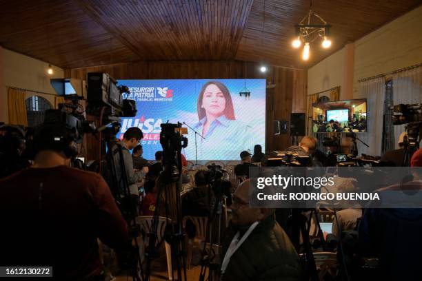 Journalists wait at the headquarters of the Ecuadorian presidential candidate for the Movimiento Revolucion Ciudadana party, Luisa Gonzalez, after...