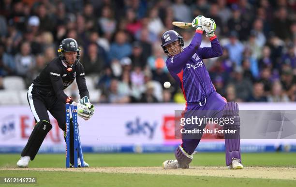 Superchargers batter Tom Banton is bowled by Usama Mir as Jos Buttler reacts during The Hundred match between Northern Superchargers Men and...