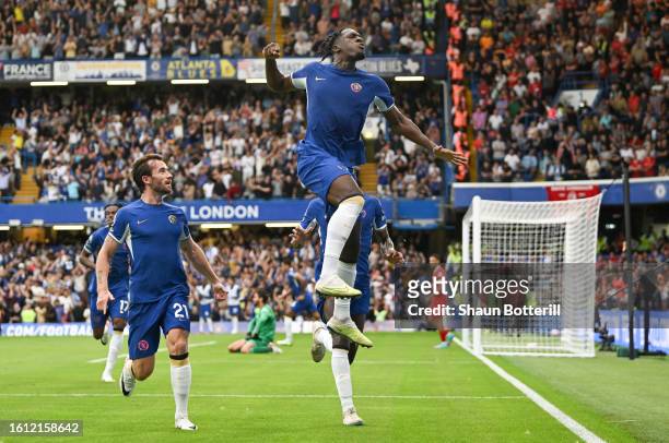 Axel Disasi of Chelsea celebrates after scoring the team's first goal during the Premier League match between Chelsea FC and Liverpool FC at Stamford...