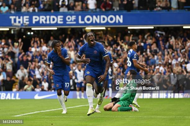 Axel Disasi of Chelsea celebrates after scoring the team's first goal during the Premier League match between Chelsea FC and Liverpool FC at Stamford...