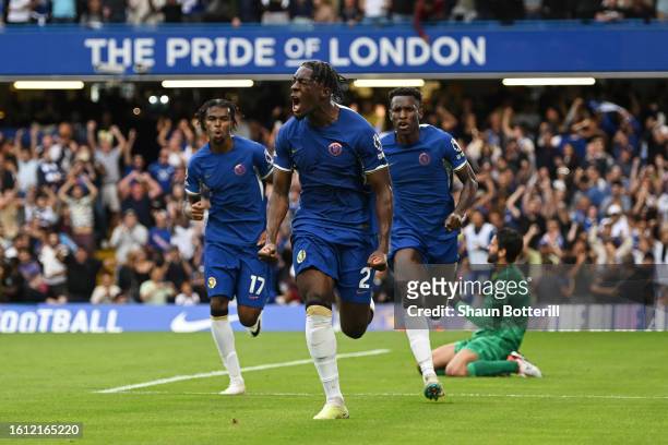 Axel Disasi of Chelsea celebrates after scoring the team's first goal during the Premier League match between Chelsea FC and Liverpool FC at Stamford...