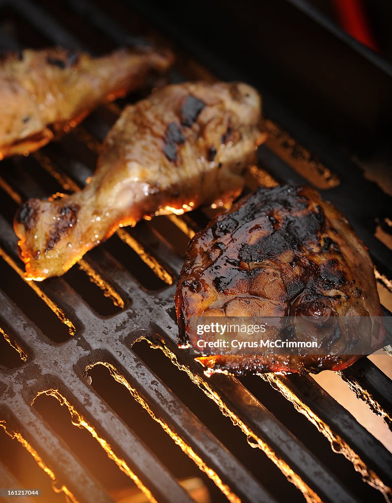 Grilling chicken for Food on Wednesday, May 18, 2011. Venezuela - Brown-Sugar-Crusted Grilled Chicken Cyrus McCrimmon, The Denver Post