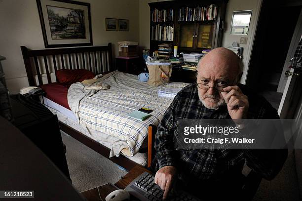 Dan Decker works on a book review at his apartment in Denver, CO, Wednesday, May 18, 2011. At 78, the retired english professor is divorced and lives...