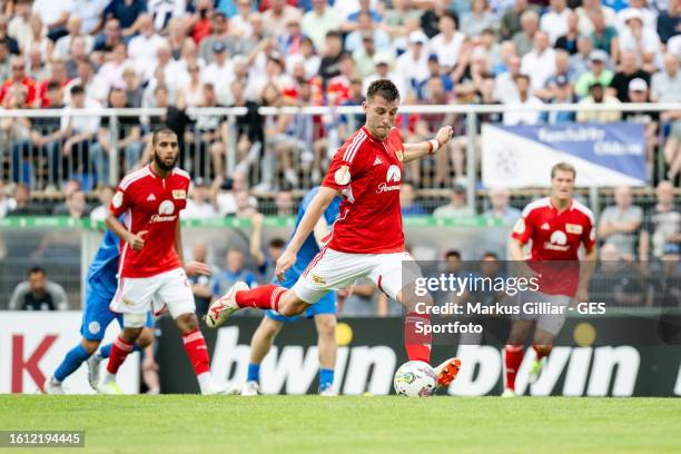 Robin Knoche of Berlin scores his team's first goal during the DFB cup first round match between FC-Astoria Walldorf and 1. FC Union Berlin at...