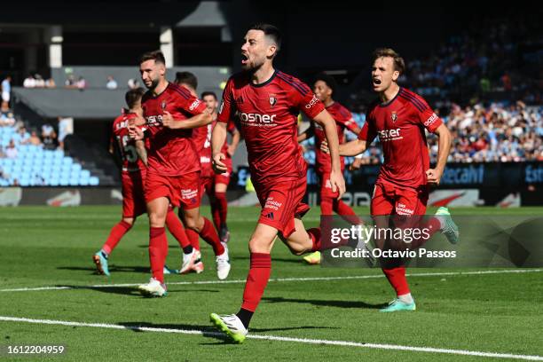 Moi Gomez of CA Osasuna celebrates with teammates after scoring the team's second goal during the LaLiga EA Sports match between Celta Vigo and CA...