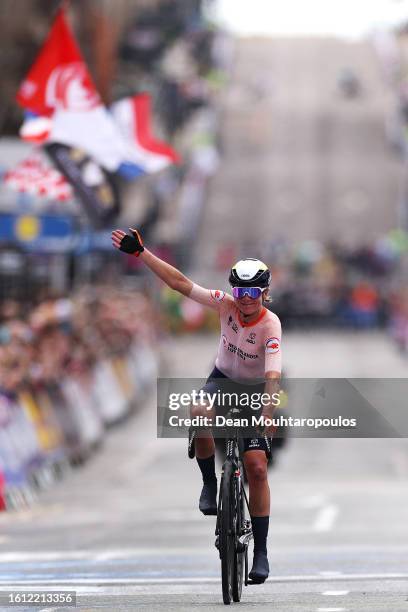 Annemiek Van Vleuten of The Netherlands reacts crossing the finish line during the Women Elite & Women U23 Road Race a 154.1km race from Loch Lomond...