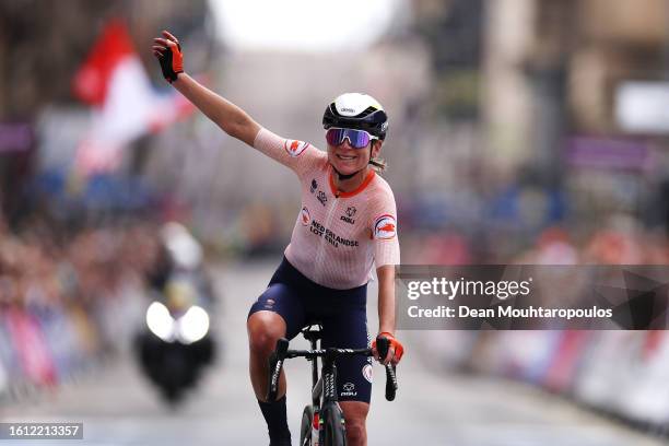 Annemiek Van Vleuten of The Netherlands reacts crossing the finish line during the Women Elite & Women U23 Road Race a 154.1km race from Loch Lomond...