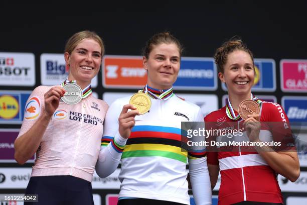 Silver medalist Demi Vollering of The Netherlands, gold medalist Lotte Kopecky of Belgium and bronze medalist Cecilie Ludwig of Denmark pose on the...